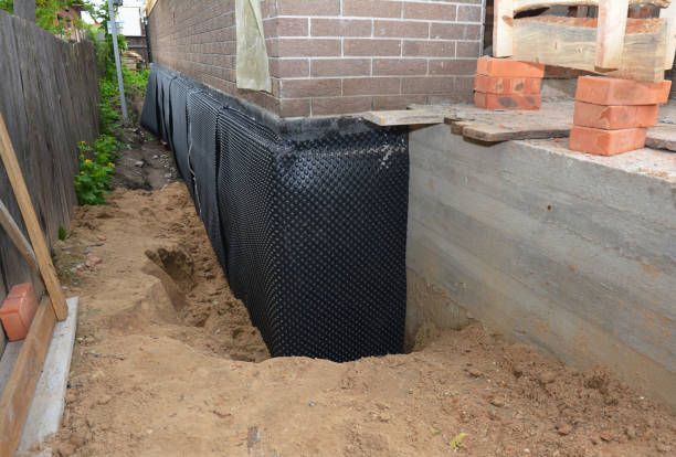 Happy homeowners after waterproofing job in Erlanger